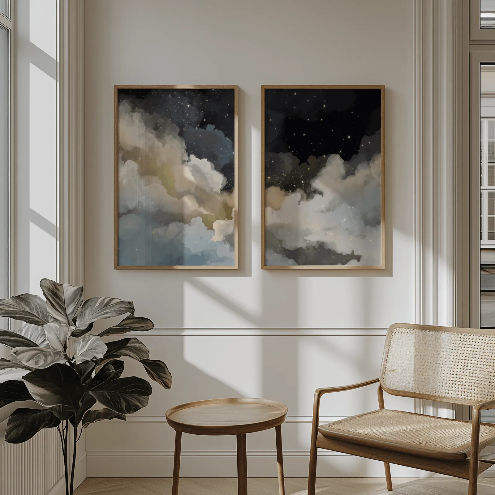 night sky clouds wall art set of 2, above wainscoting beside a cane armchair and fiddle-leaf fig