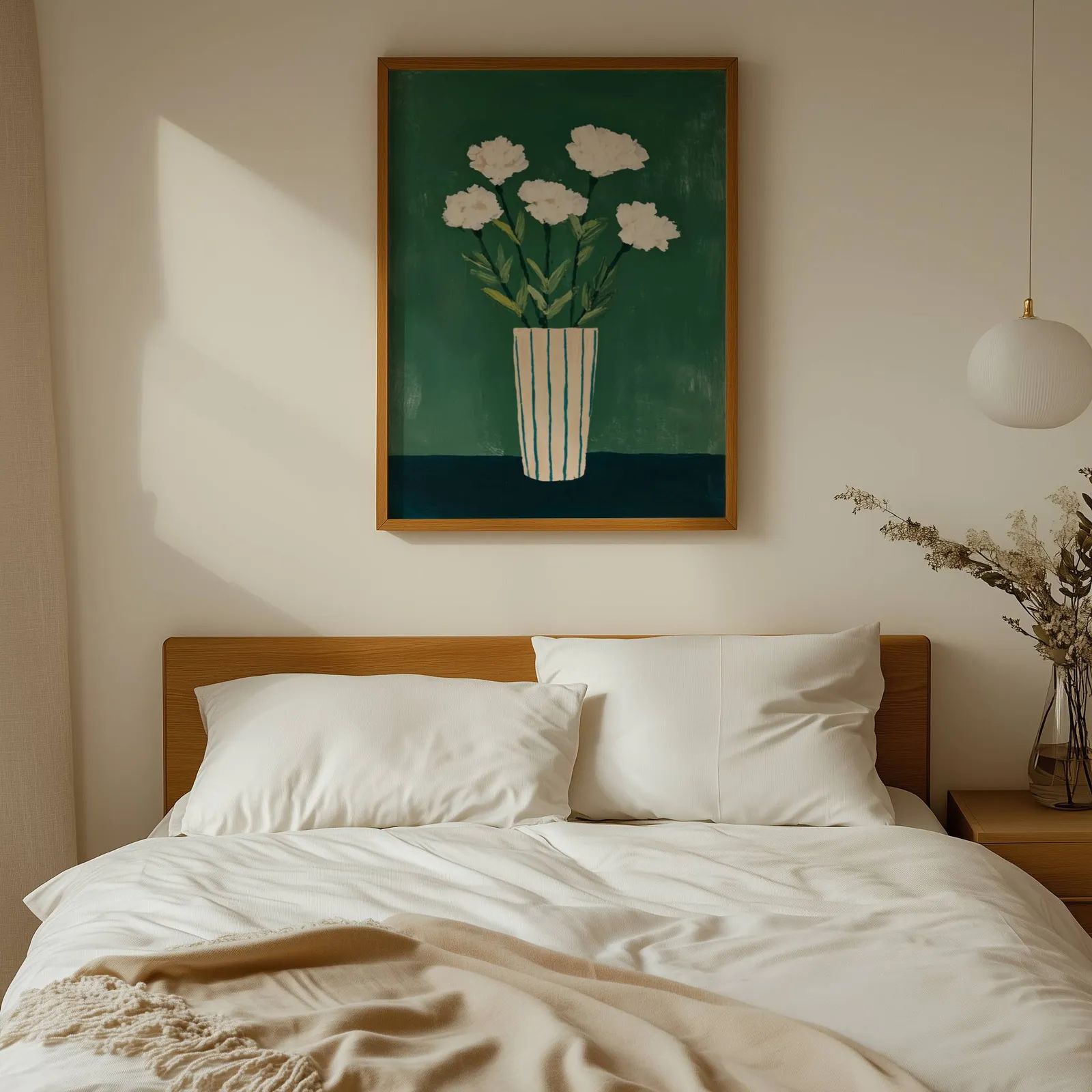 green floral wall art with white flowers in striped vase, above a wooden headboard with white linen pillows