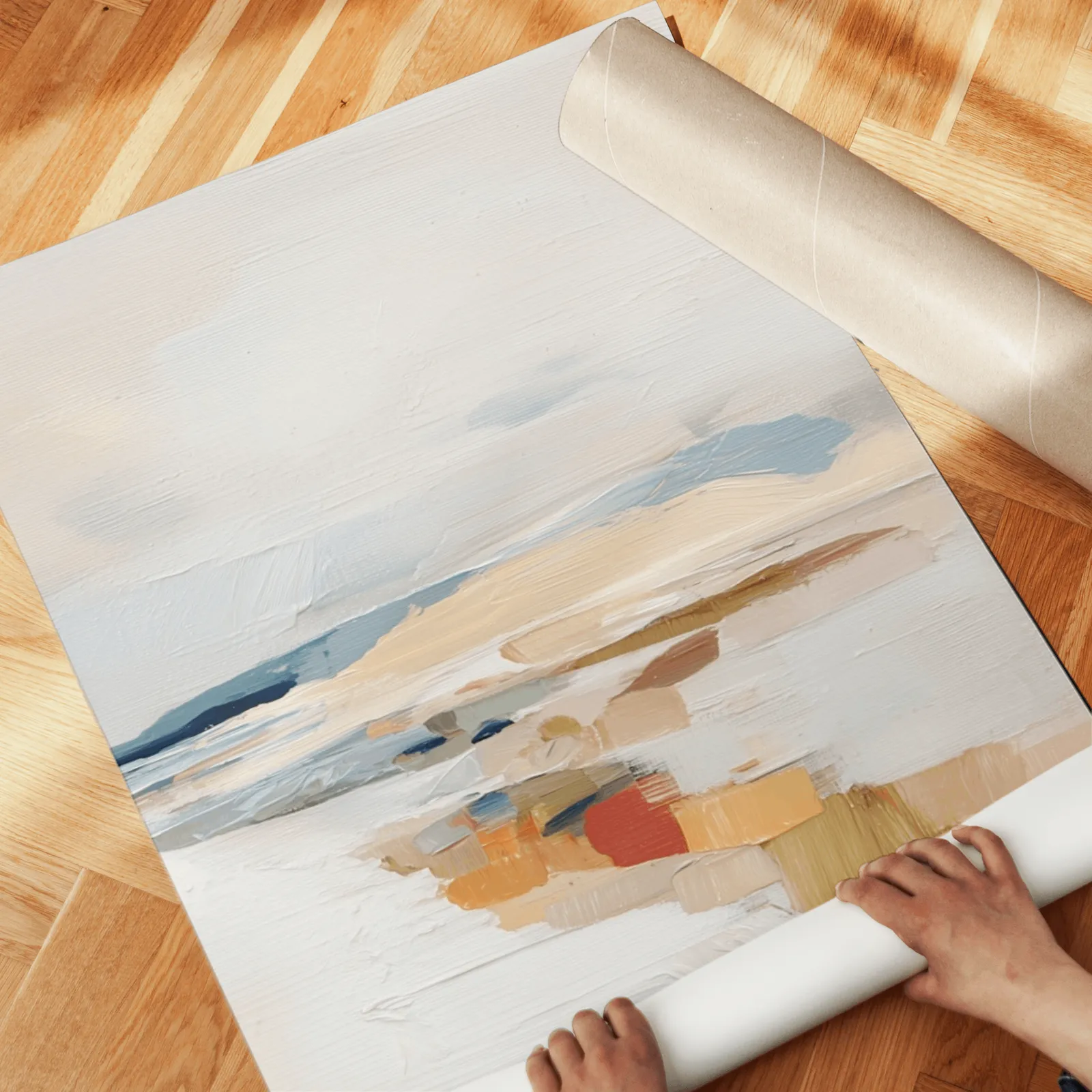 beige coastal abstract wall art set of two, unrolled across a herringbone parquet floor by hand