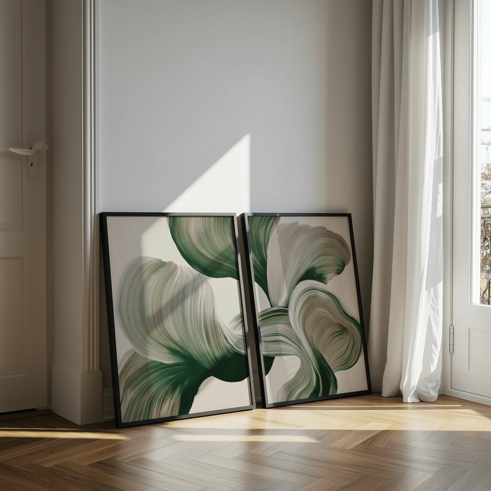 green abstract botanical wall art set of two, leaning against a sunlit wall by herringbone floor and sheer curtains