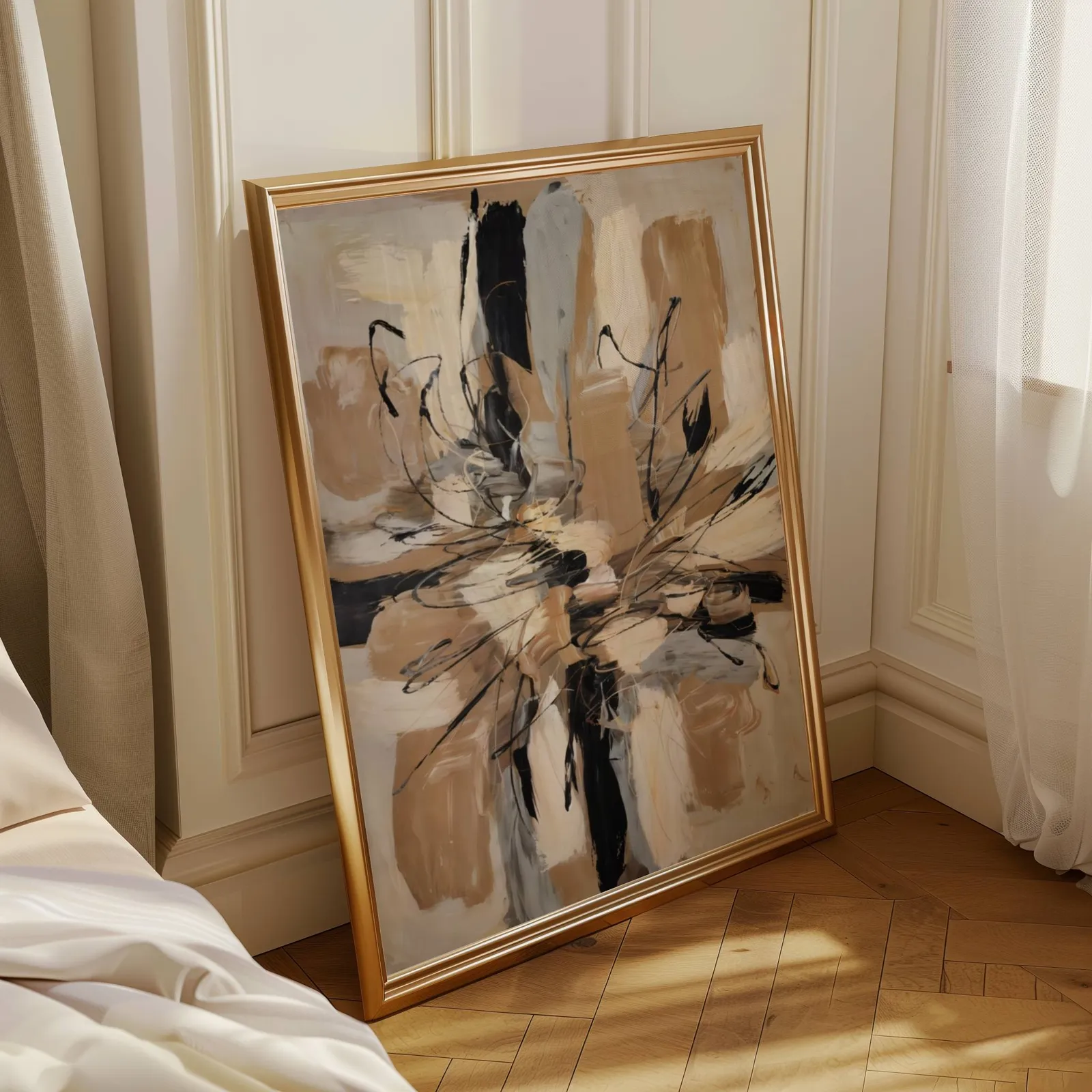 abstract wall art in beige and black, leaning in a sunlit corner beside sheer curtains and herringbone floor