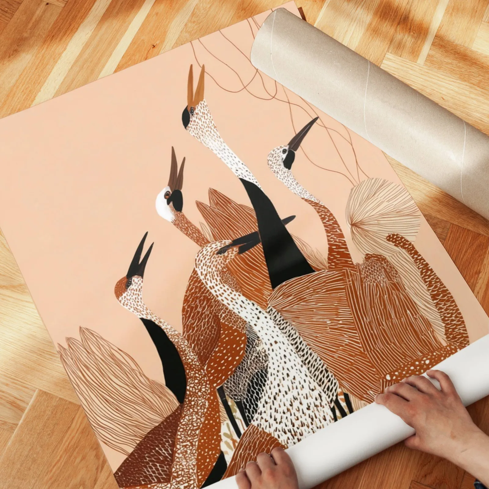 terracotta crane wall art, unrolled across a herringbone parquet floor by hand