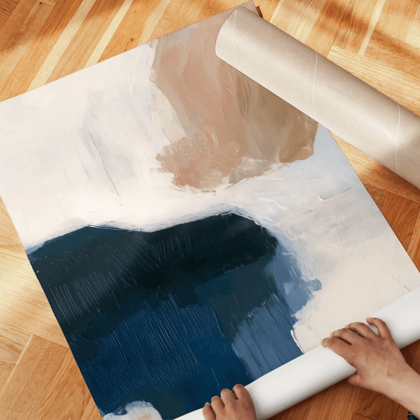 blue beige abstract triptych wall art, unrolled across a herringbone wood floor by hand