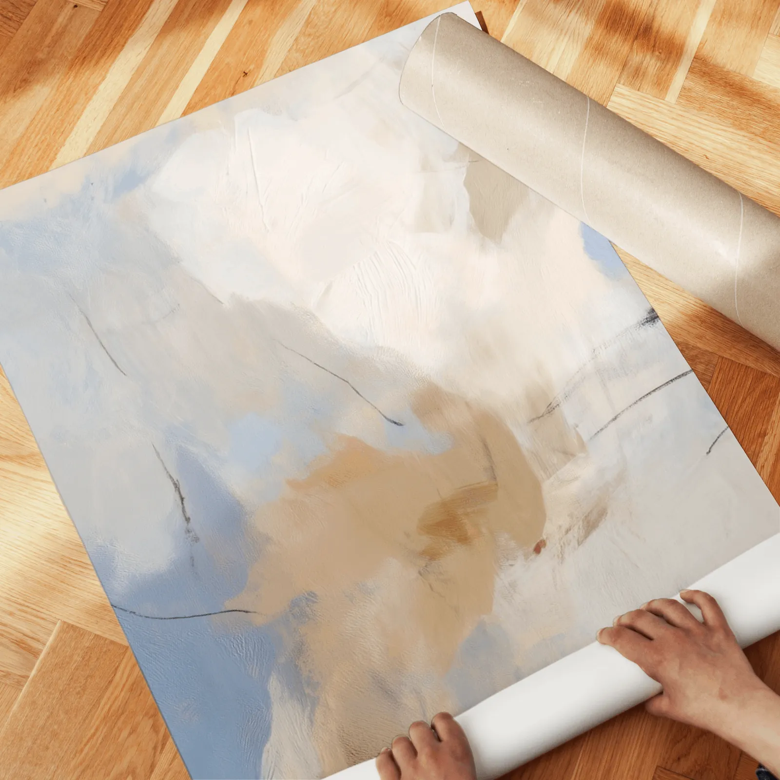 blue and terracotta abstract coastal wall art set of 3, unrolled across a herringbone wood floor by hand