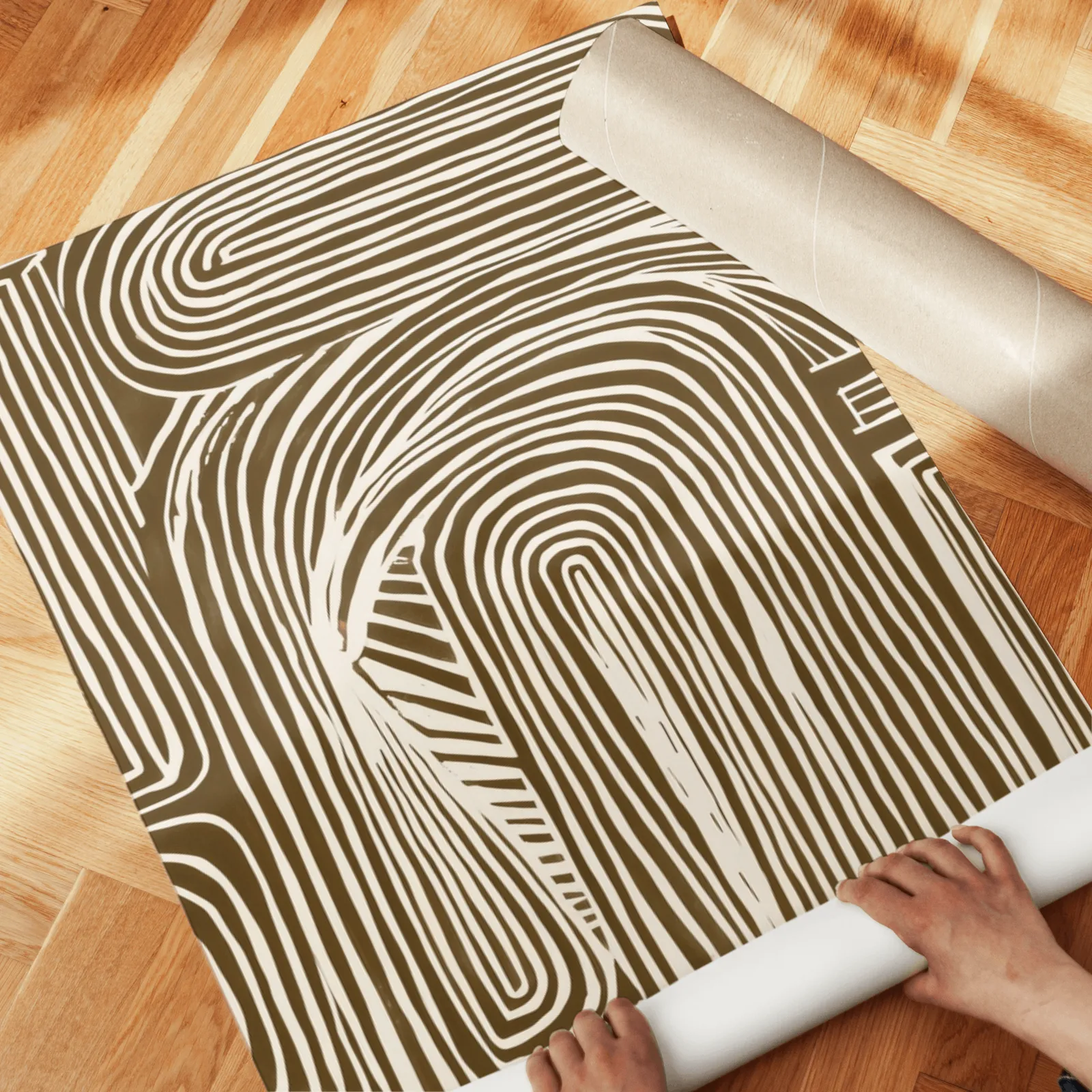 brown abstract line art set of two, unrolled across a herringbone parquet floor by hand