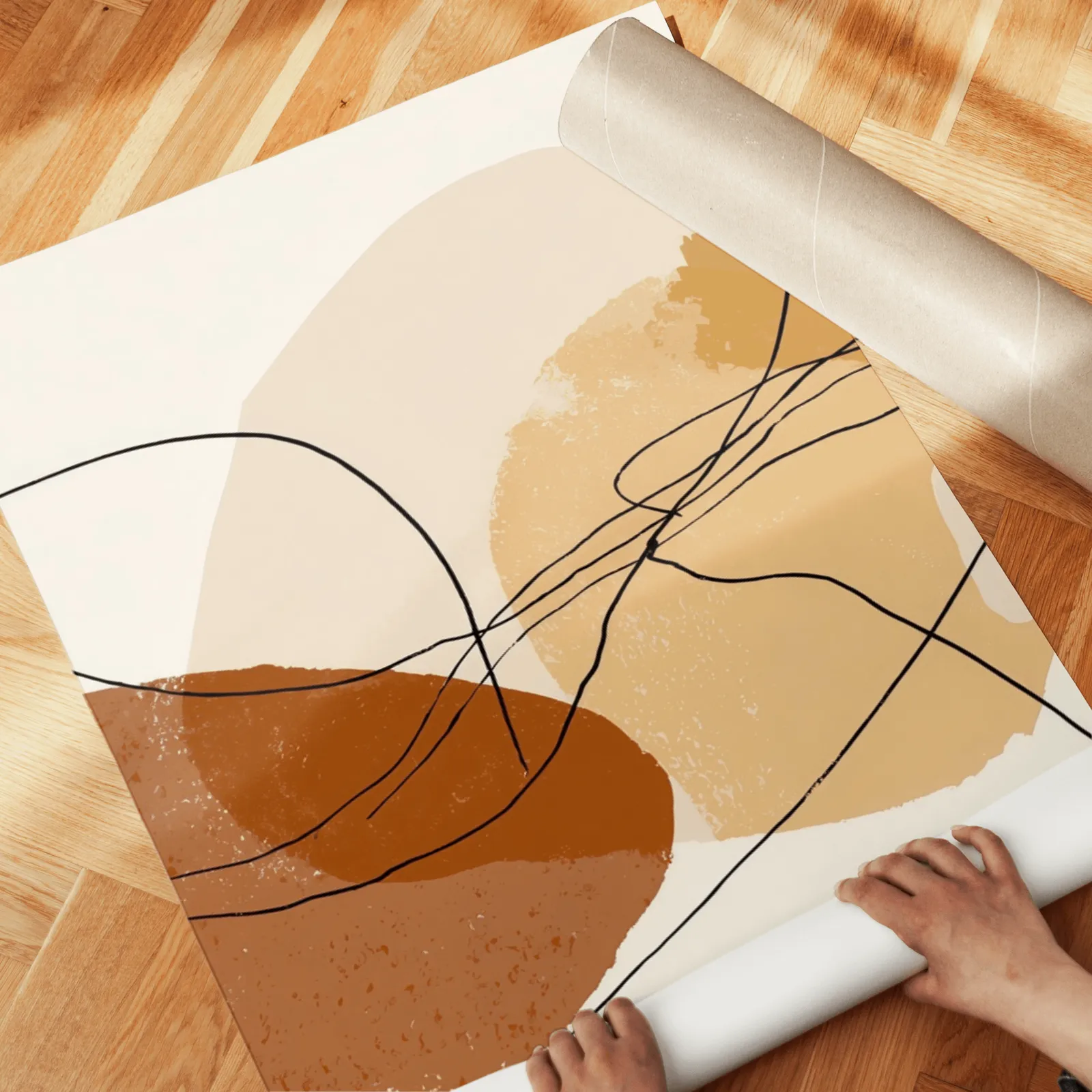 terracotta abstract minimalist wall art set of three, unrolled across a herringbone wood floor by hand