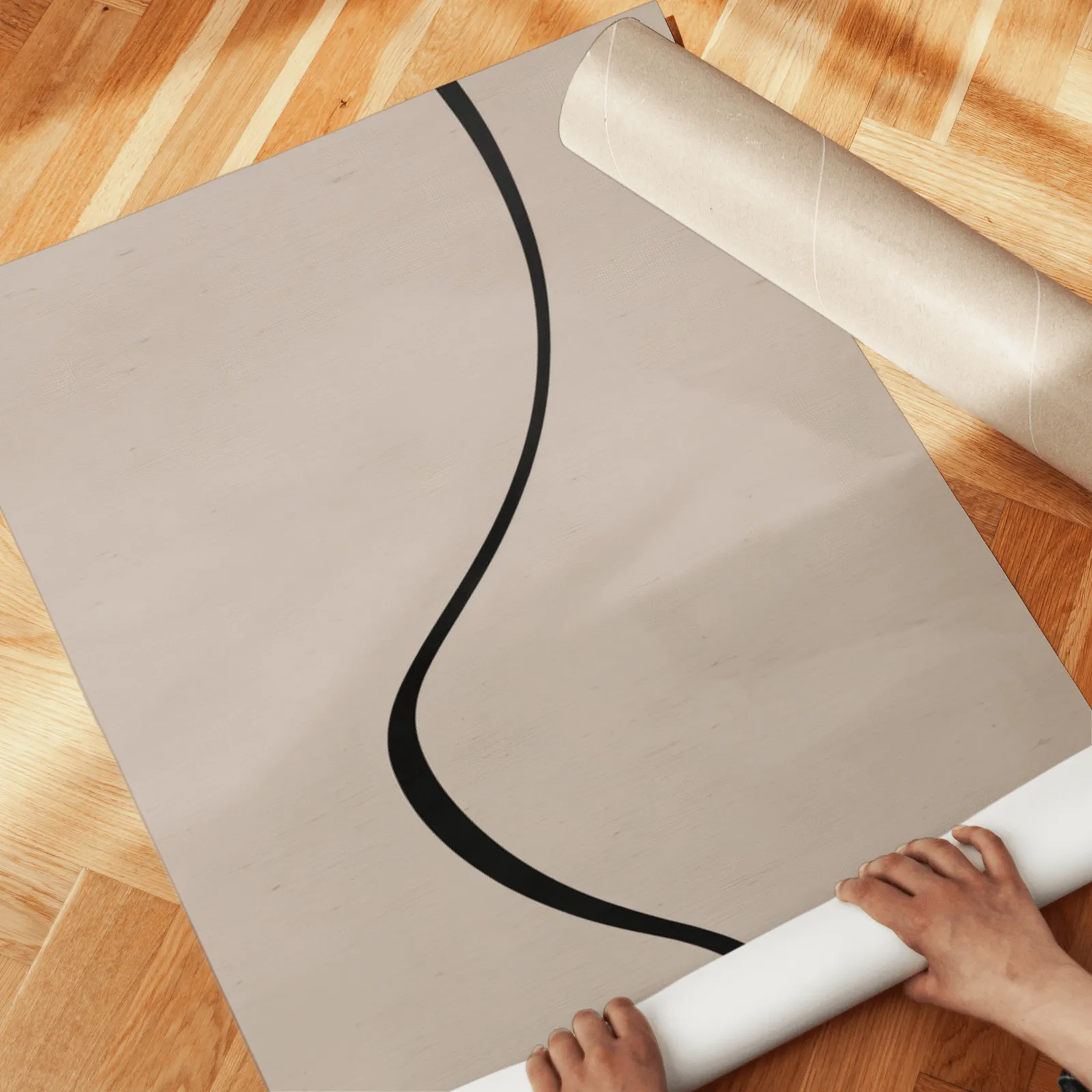 beige abstract minimalist wall art set of two, unrolled across a herringbone parquet floor by hand