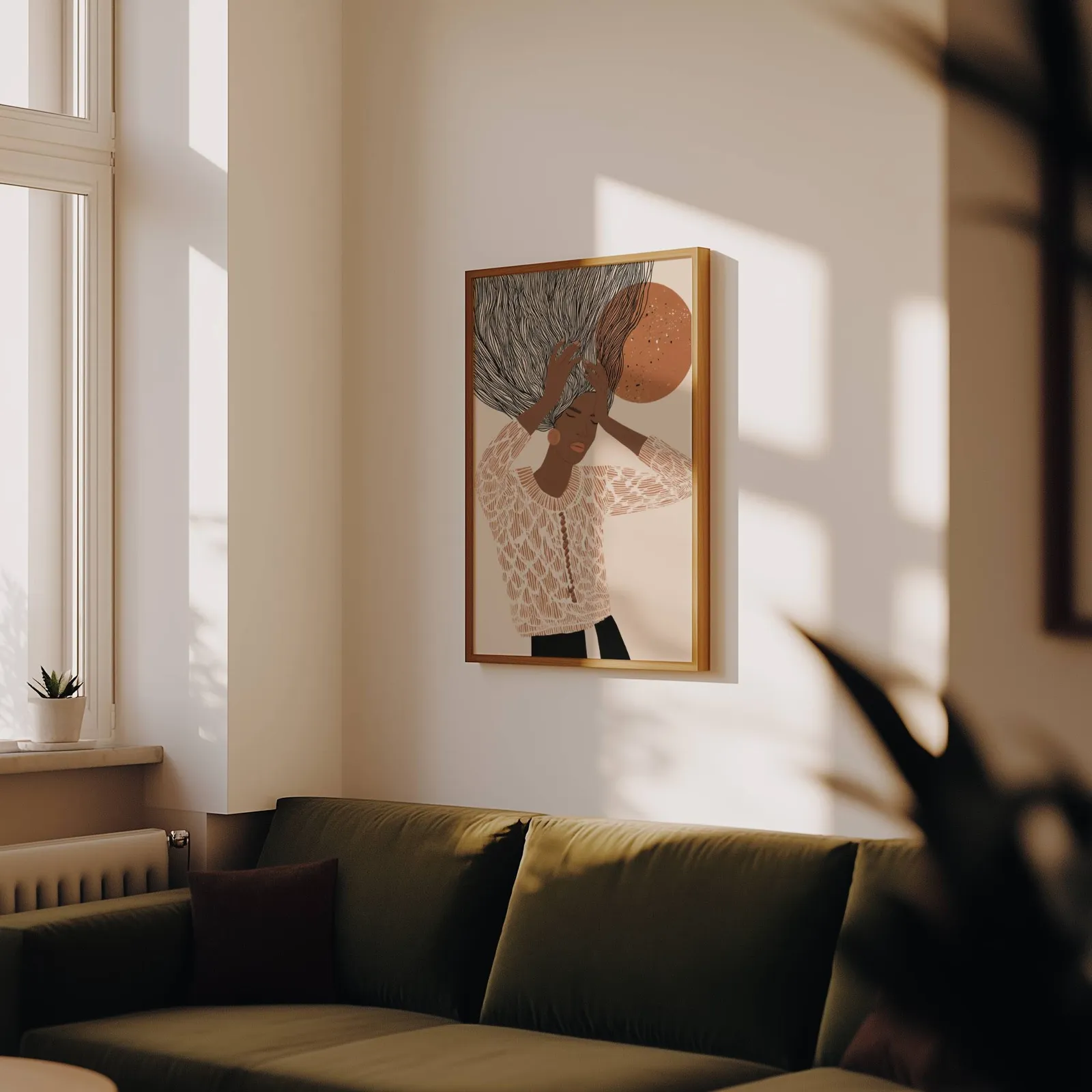 terracotta abstract woman wall art with flowing hair, above an olive velvet sofa in raking afternoon light