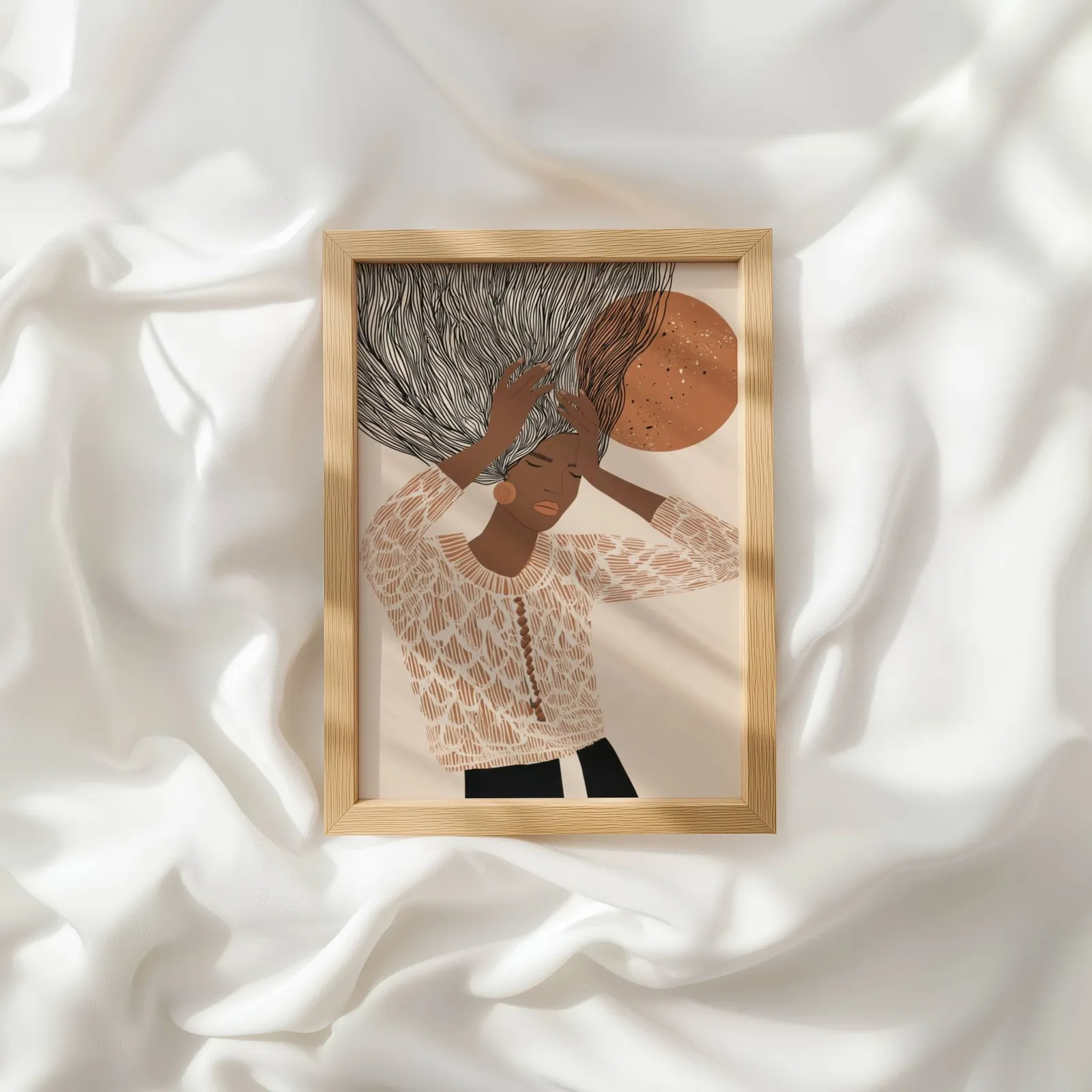 terracotta abstract woman wall art with flowing hair, resting atop rumpled white silky fabric