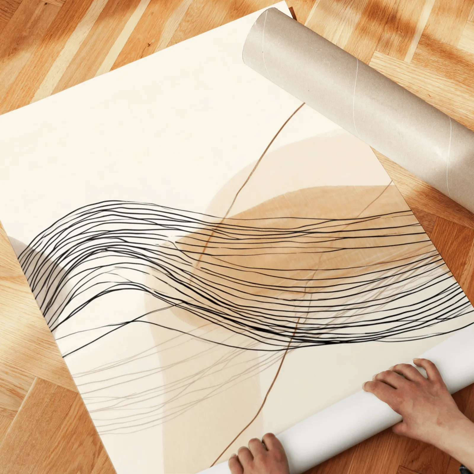 neutral abstract triptych wall art in terracotta and beige, unrolled across a herringbone wood floor by hand